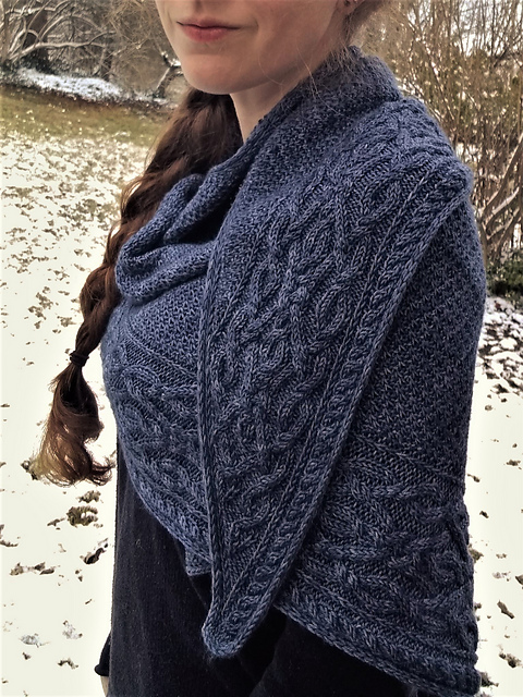 Navy heathered shawl with intricate cables and slip stitch pattern