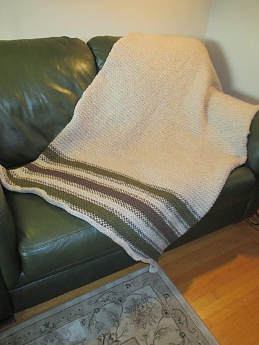 blanket has three narrow stripes on the narrow ends.