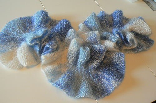 Scarf has ruffles on both edges that give it lots of character, especially when knit in a colorful, striped yarn.
