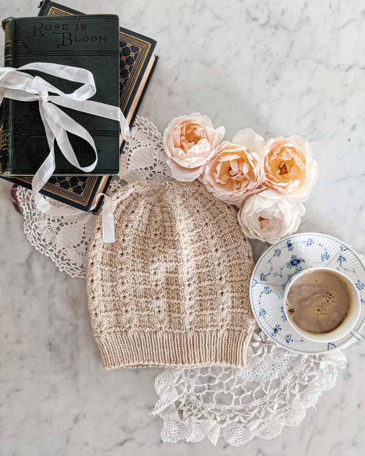 A highly textured and soothing knitting pattern for a hat in four sizes