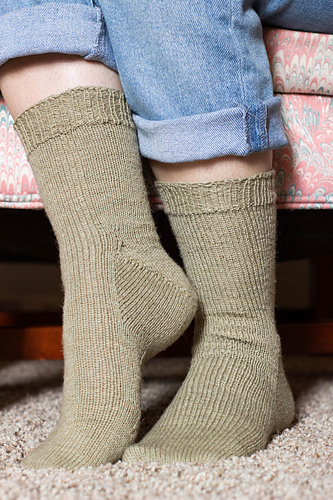 Socks include toe up and cuff down basic sock with small ribbed cuff knit in non-superwash yarn