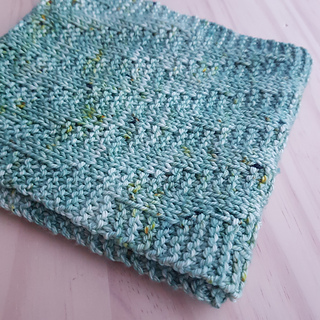 An aqua textured cowl